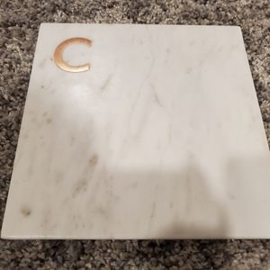 Cheese plate with "C" monogram.